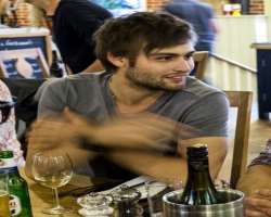 Douglas Booth consuming alcohol